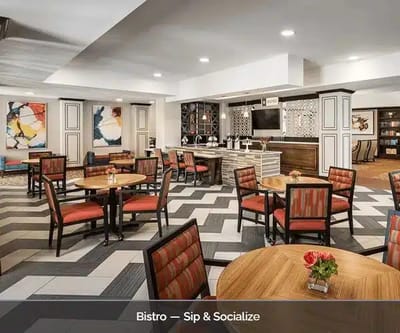 Interior view of a bistro area with dining tables