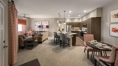 Bright interior living space with dining area and kitchen