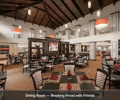 Bright dining room with tables set for friends