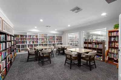 Interior view of a cozy library with bookshelves
