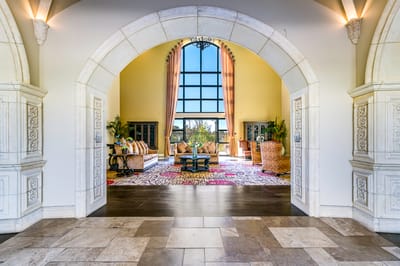 Interior common area with large windows and seating