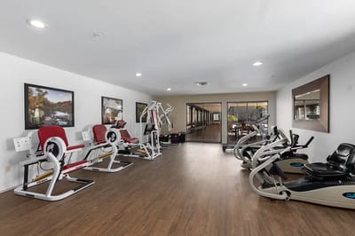Interior view of a fitness area with exercise equipment