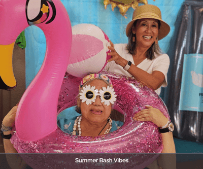 Residents celebrating with summer-themed decorations