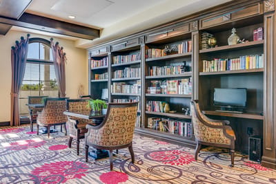 Interior common area with bookshelves and seating