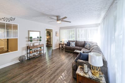 Cozy common area with a sectional sofa and natural light