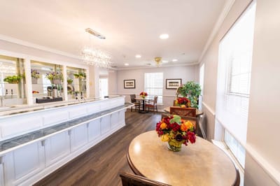 Bright common area with floral decoration and seating