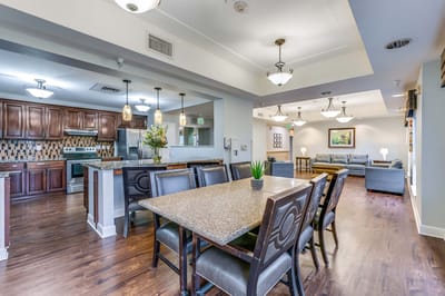 Common area with dining table and living space