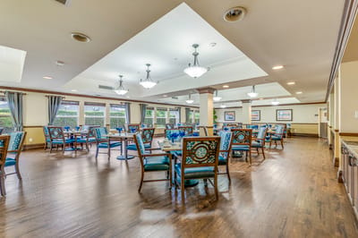 Dining area with colorful chairs and tables
