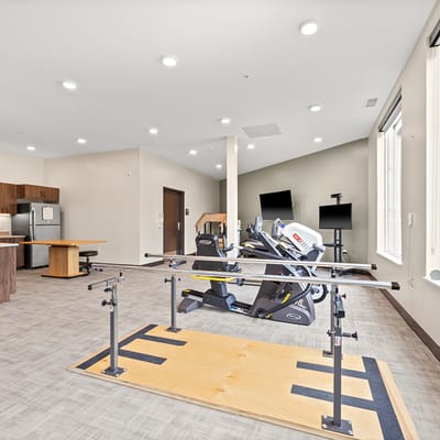 Interior view of a fitness area with exercise equipment
