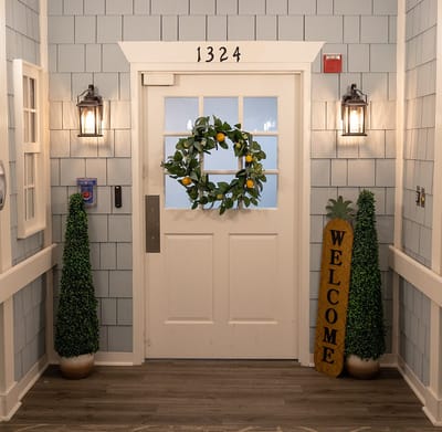 Welcoming entrance door with decorations and plants