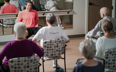 Residents participating in a wellness activity session