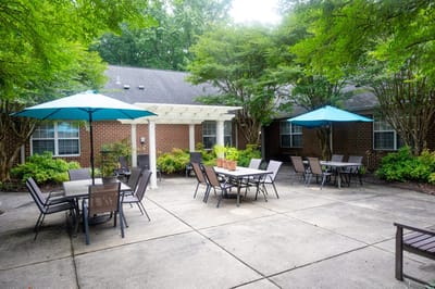 Outdoor courtyard with seating and umbrellas