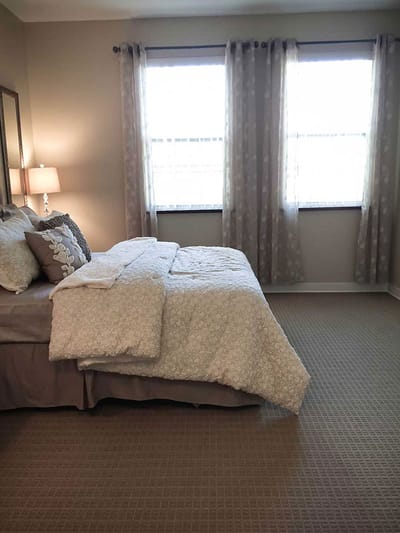 Cozy private room with a bed and natural light