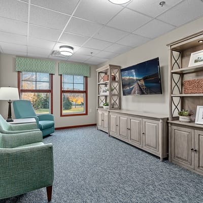 Bright common area with comfortable seating and decor