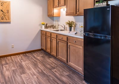Interior kitchen space with cabinets and decor