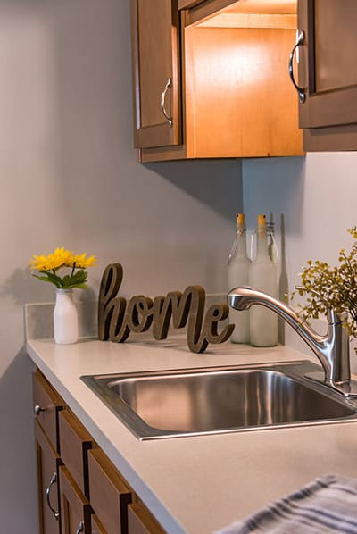Well-lit kitchen area with decorative accents