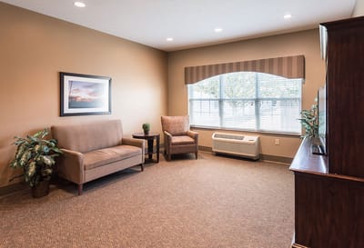 Cozy common area with seating and window view