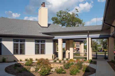 Exterior view of the facility with garden