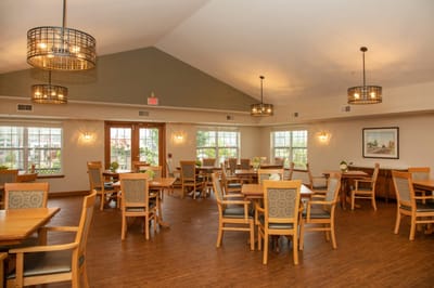Bright dining room with wooden tables and chairs