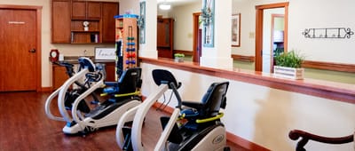 Interior view of a fitness area with exercise equipment