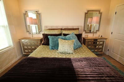 Cozy decorated bedroom with elegant bedding