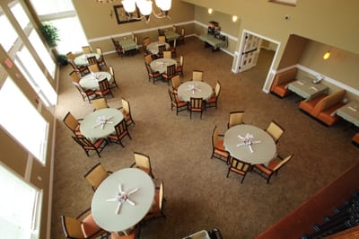 Dining area with neatly arranged tables and chairs