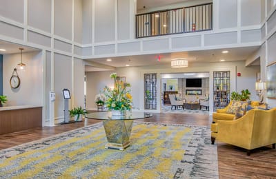 Bright and welcoming lobby area with seating and decor