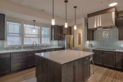Modern kitchen area with island and seating