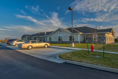 Exterior view of Northridge Village with parked vehicles