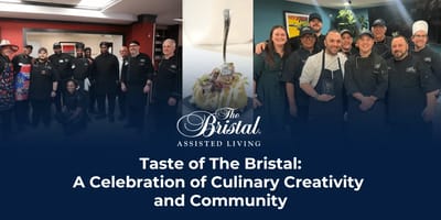 Group of chefs and staff celebrating a culinary event
