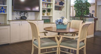 Interior common area with a table and floral arrangement