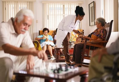 Staff interacting with residents in a common area