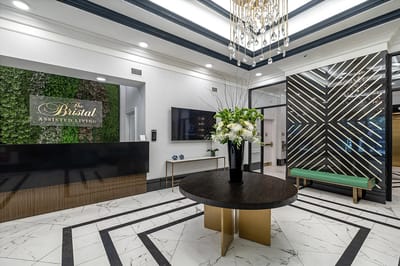 Luxurious lobby with a modern design and floral centerpiece