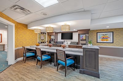 Bright common area with seating and decor