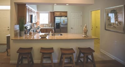 Bright kitchen space with granite countertops