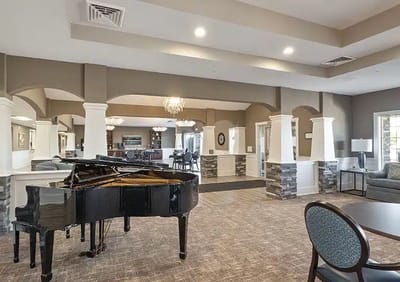 Interior view of a common area with a piano