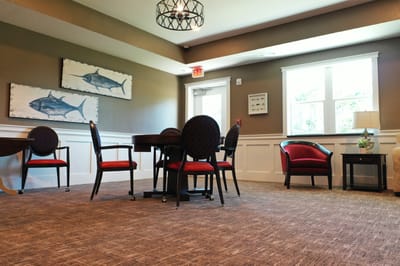 Cozy common area with dining tables and chairs