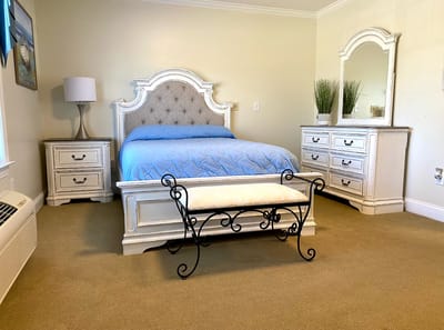 Comfortable resident bedroom with stylish furnishings