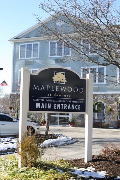 Facility sign for Maplewood at Danbury's main entrance