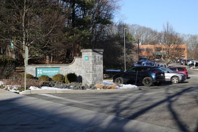 Entrance sign and parking area of Havencare facility