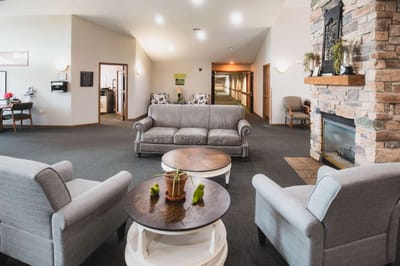 Common area with seating and fireplace
