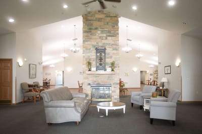 Interior view of a cozy common area with seating
