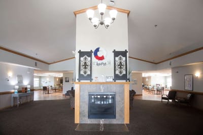 Common area with a fireplace and seating