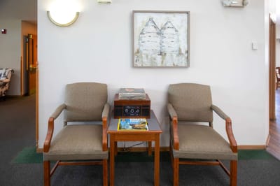 Cozy interior seating area with artwork