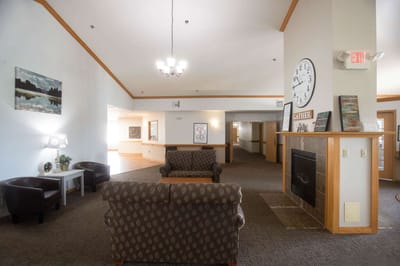 Interior view of a cozy common area with seating