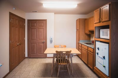 Cozy kitchen area in a senior living facility apartment