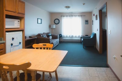 Cozy interior of a resident room with living area