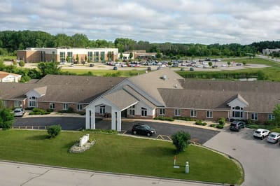 Aerial view of Pleasant Point Senior Living building and grounds