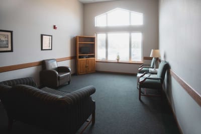 Quiet common area with seating and natural light