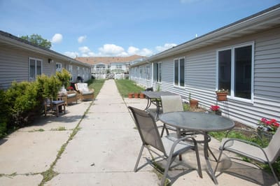 Outdoor courtyard area with seating and pathways